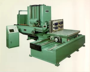 1976-TARUS-Gundrill-300x240 (1) Lauer Machine Logo